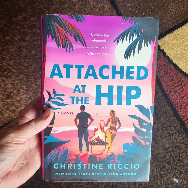 Attached at the Hip (HC, 2024) by Christine Riccio First Edition
