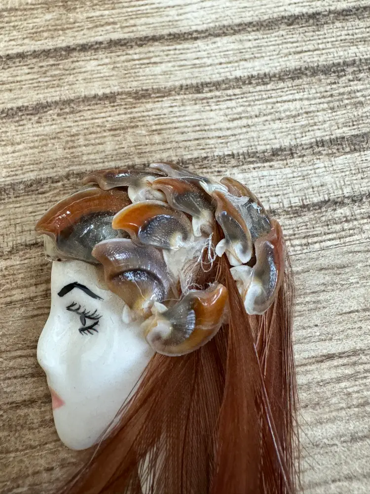 Lady Face With Shells And Feathers Detail Around Her Head-Signed And Dated