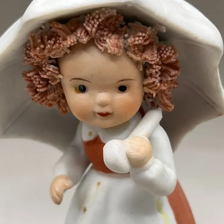 Ceramic Girl Figurine With Snail Spaghetti Hair 4”