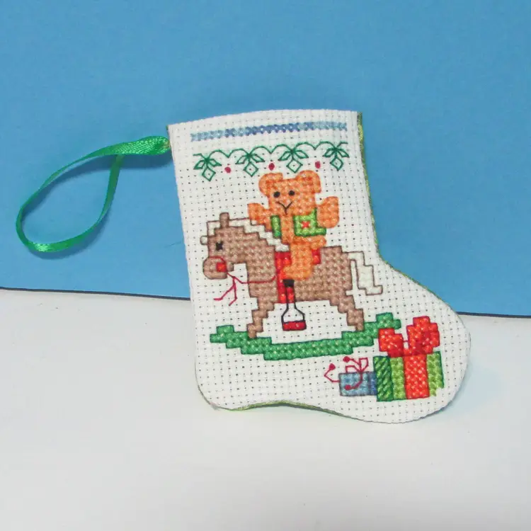 #01 completed handmade cross stitch small Christmas stocking ornament rocking horse