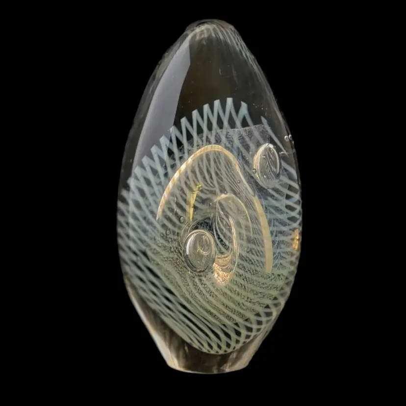 Robert Eickholt Paperweight Signed 1997 Egg Shape Clear Art Glass White Iridescent Swirl Glows
5.25” T x 2.75” W