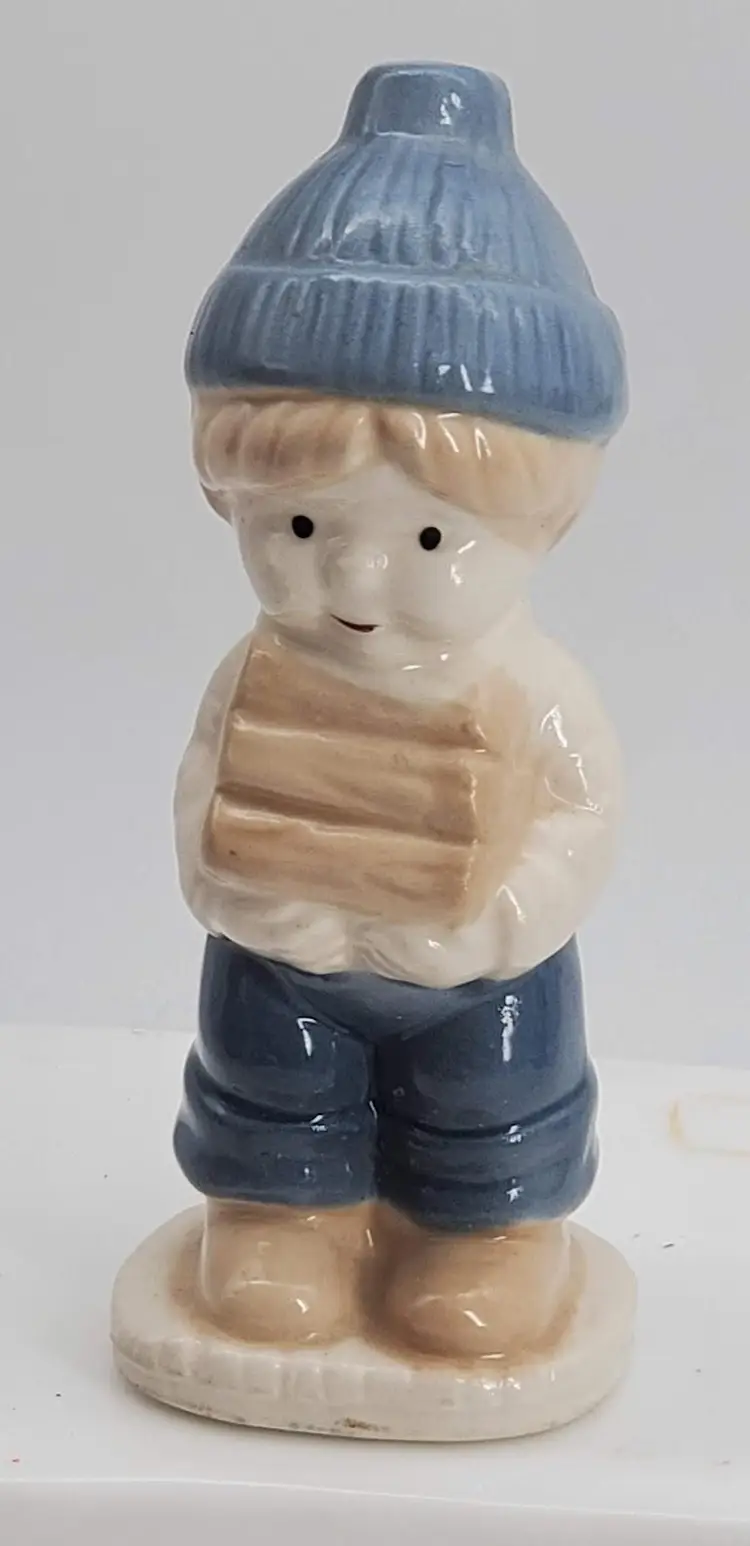 Porcelain Figurine Boy Carrying Firewood