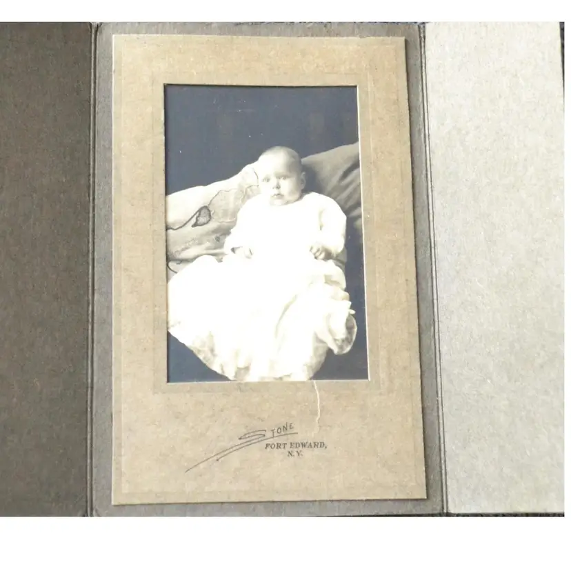Vintage Black And White Studio Taken Photograph Of Infant In Cardstock Folder