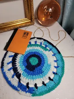 Beautiful blue colored crocheted round table cover