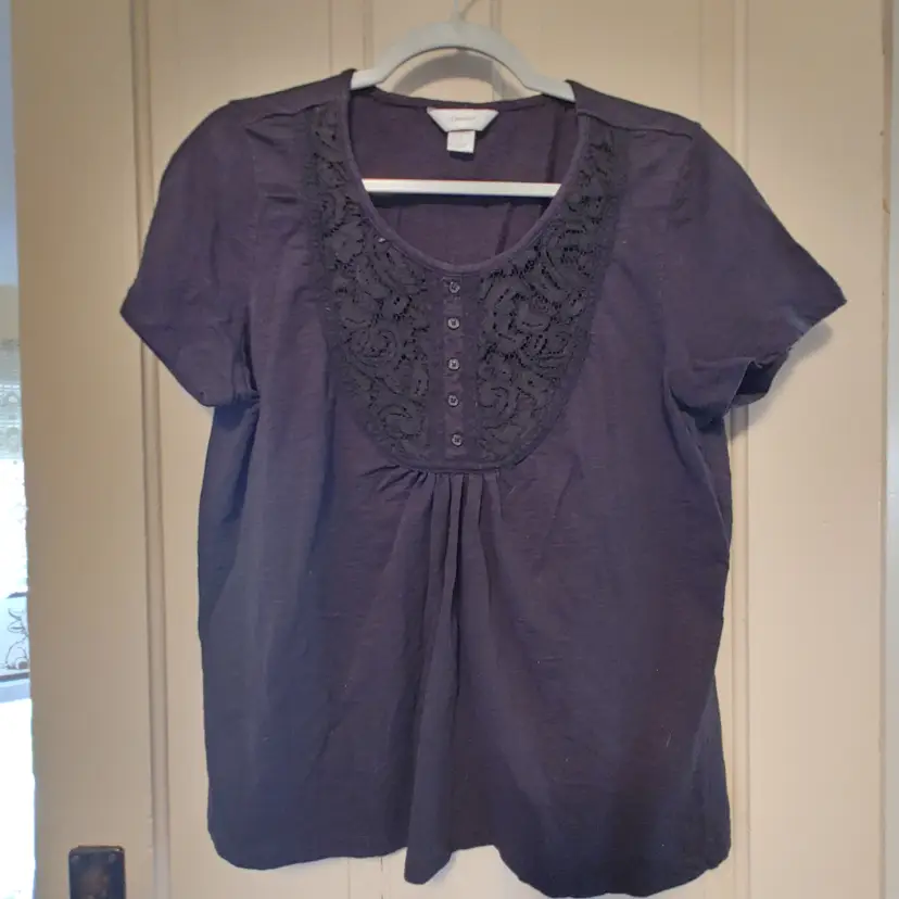 Top- Brand: CJ Banks. Size X. Black lace top. Material- 100% cotton. No callouts.