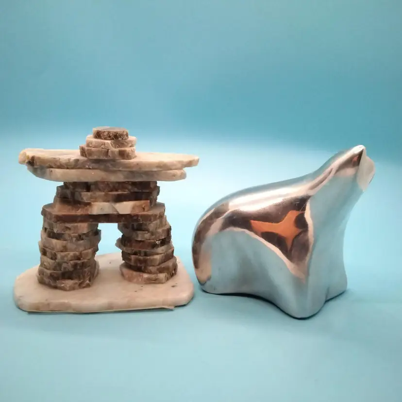 Canadian Teasure Collection.
Solid Aluminum Polar Bear, Numbered And Signed. Inukshuk Stone Form Of Man.