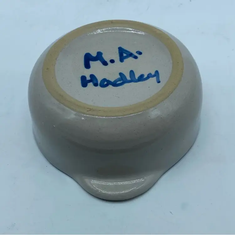 #1504 Hand-painted M.A. Hadley Pottery snowman handled dish.