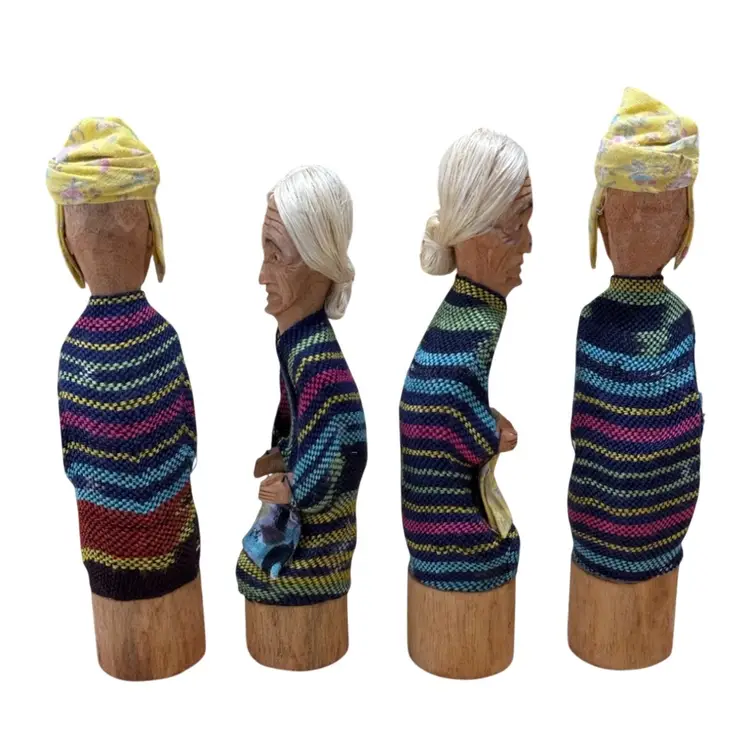 Tau-tau figurines, which are traditional wooden effigies from the Toraja ethnic group in South Sulawesi, Indonesia