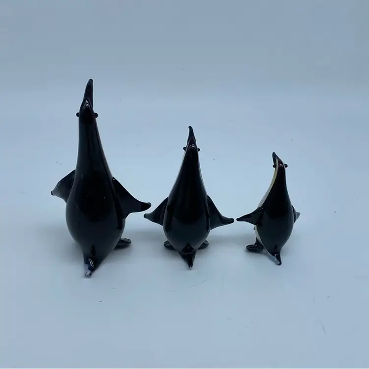 #1469 A set of three vintage Murano glass penguin figurines.