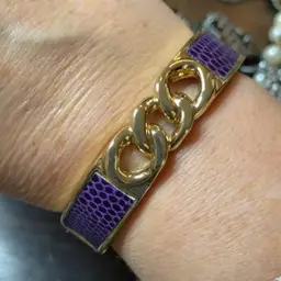 Gold tone and purple clamper bracelet