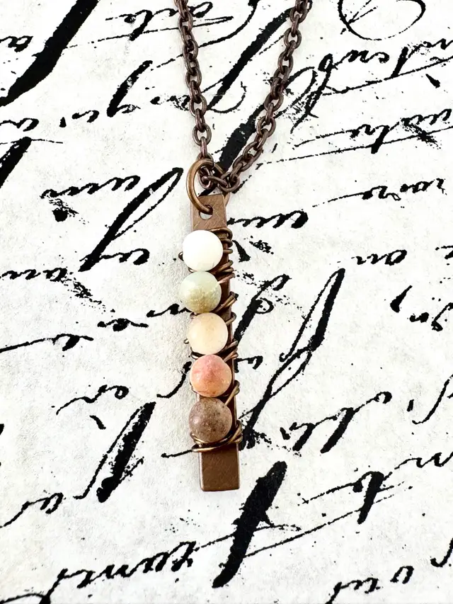 #44 Multi Color Jasper Beads Wire Wrapped To A 1 1/4” Bronze Brass Bar Hanging On A Brass Chain Necklace 25”