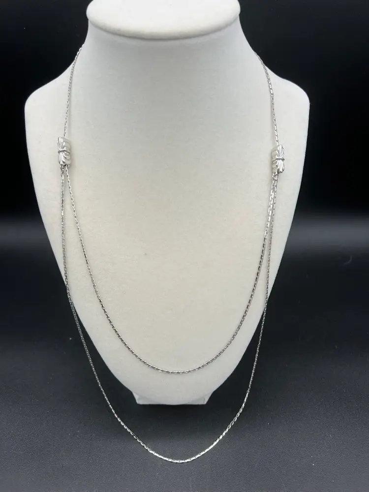 Silver Tone Double Stranded Adjustable Necklace With Bow Detail