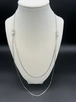 Silver Tone Double Stranded Adjustable Necklace With Bow Detail