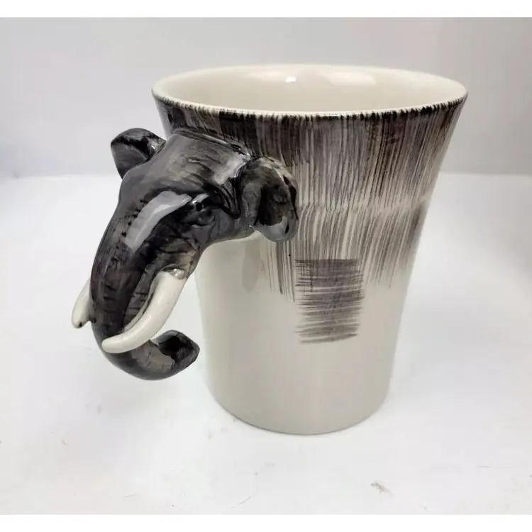 Pier 1 One Imports 3D Elephant Head Trunk Handle Coffee Mug Cup 
16 oz Gray White