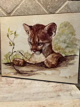 Artwork Artist Signed, Lithograph Wall Hanging of Cat Puma Cub & Ladybugs 🐞 On Wood Approximately 9.75 Inches Long