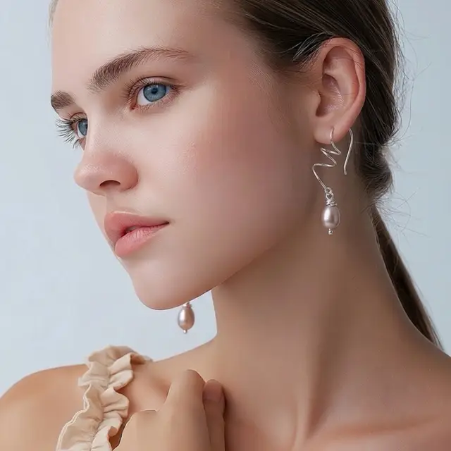 Sterling Silver Spiral Earrings With Iridescent Pearl