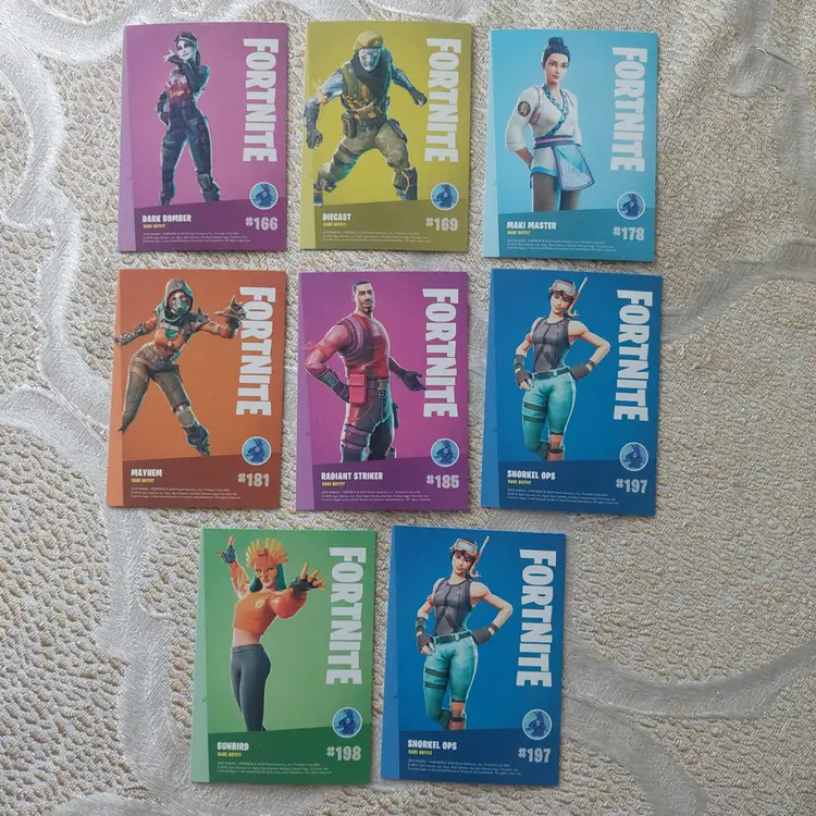 Lot of 9 2019 Panini Fortnite set, 8 rare outfit cards and 1 epic outfit card. (E)