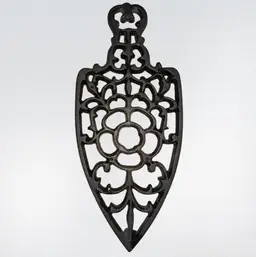 Cast Iron~Iron Shaped Trivet 8” X 3.5”