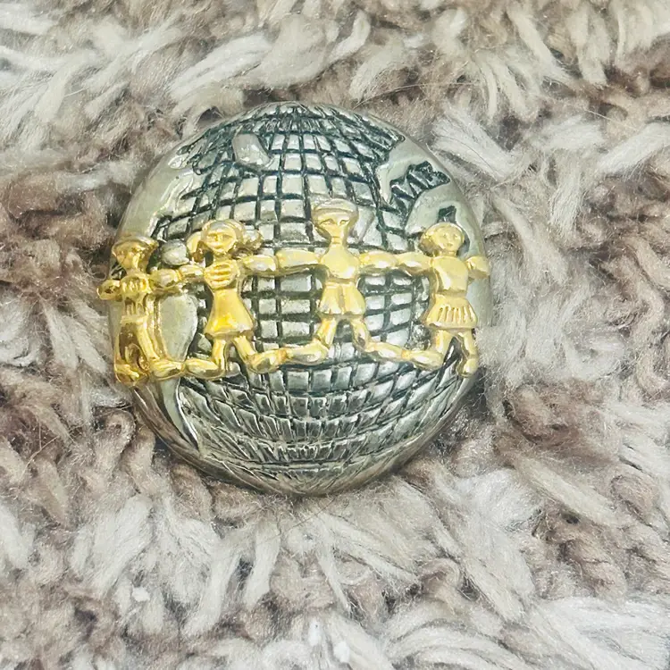 Vintage AJC Global Unity Brooch 2 Tone People of the World Connected 1 Family
