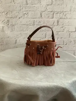 Brown Minibrand bag with tassels