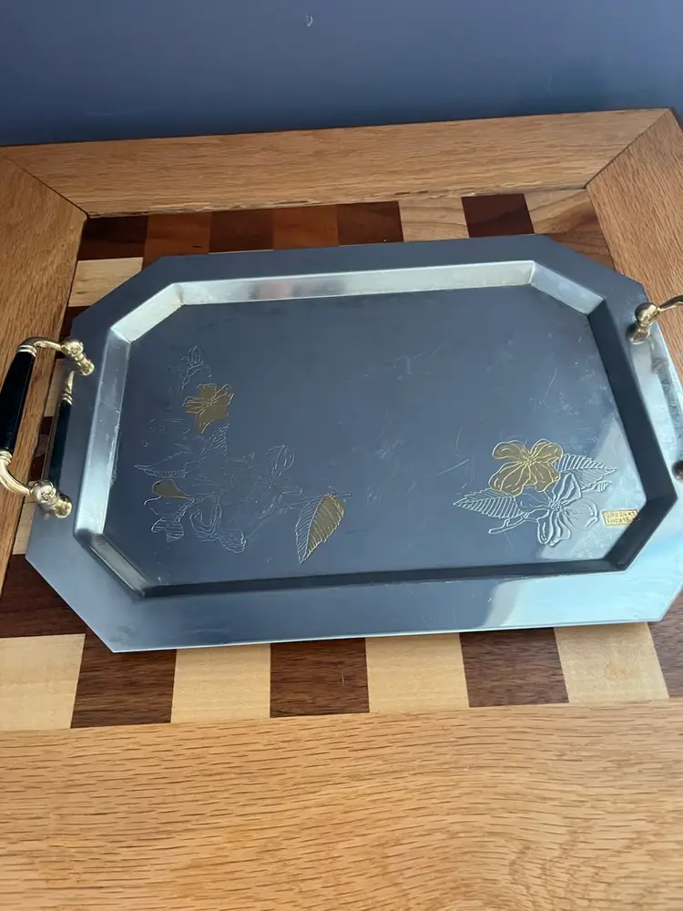 #01 Vintage Italian stainless steel serving tray with 24K gold inlay.
** Note Right Handle Does Not Have Black Piece On Handle****
15x10.25”