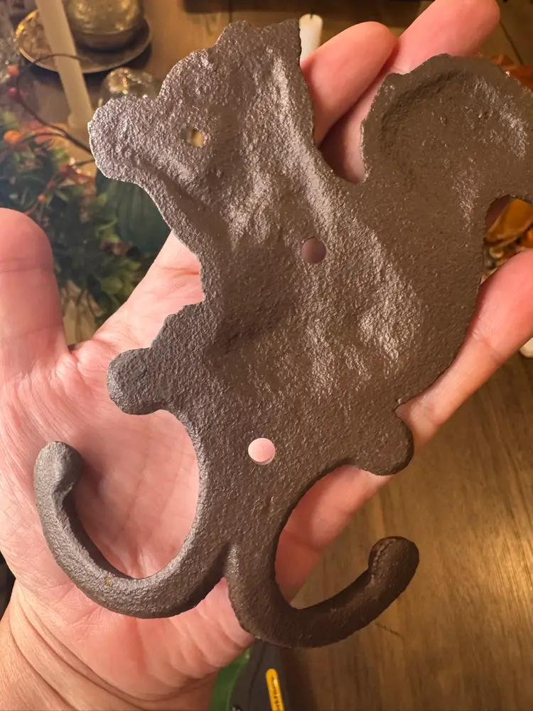 Cast iron squirrel or chipmunk wall hook.