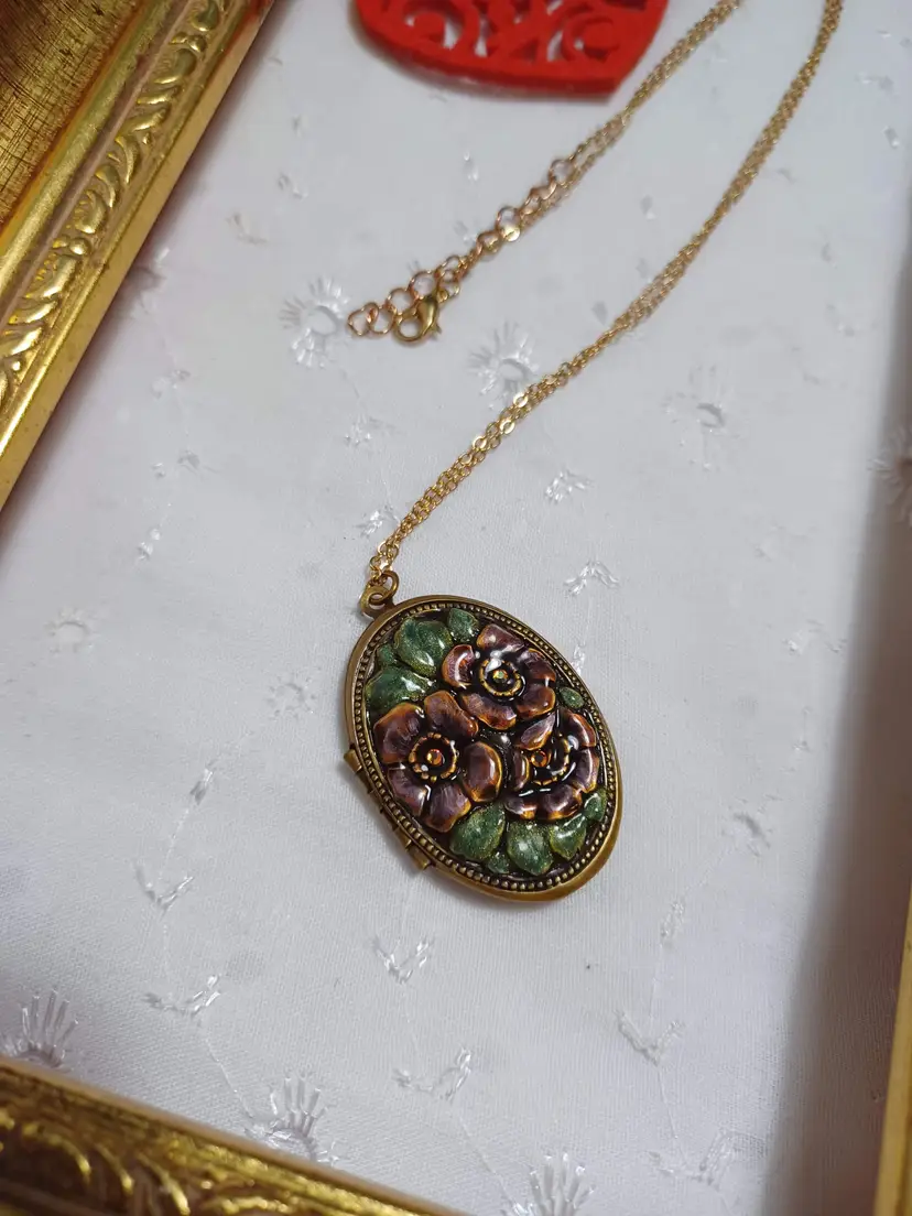 Beautiful floral and rhinestone locket