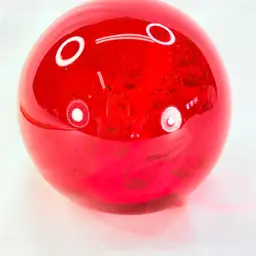 Large Red Paperweight With Bubbles