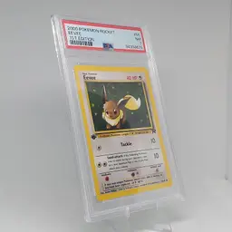 Vintage 1st Edition Eevee #55 PSA 7 2000 Pokemon Team Rocket Near Mint TCG