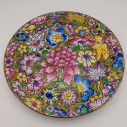 Yang Cheng handpainted porcelain plate, Mille Fleur