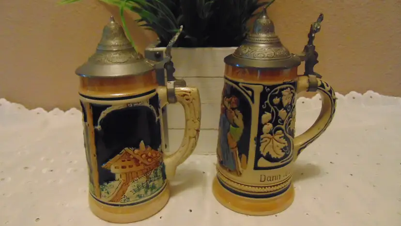 Beautiful pre owned German Beer Steins- sold as a set of 2