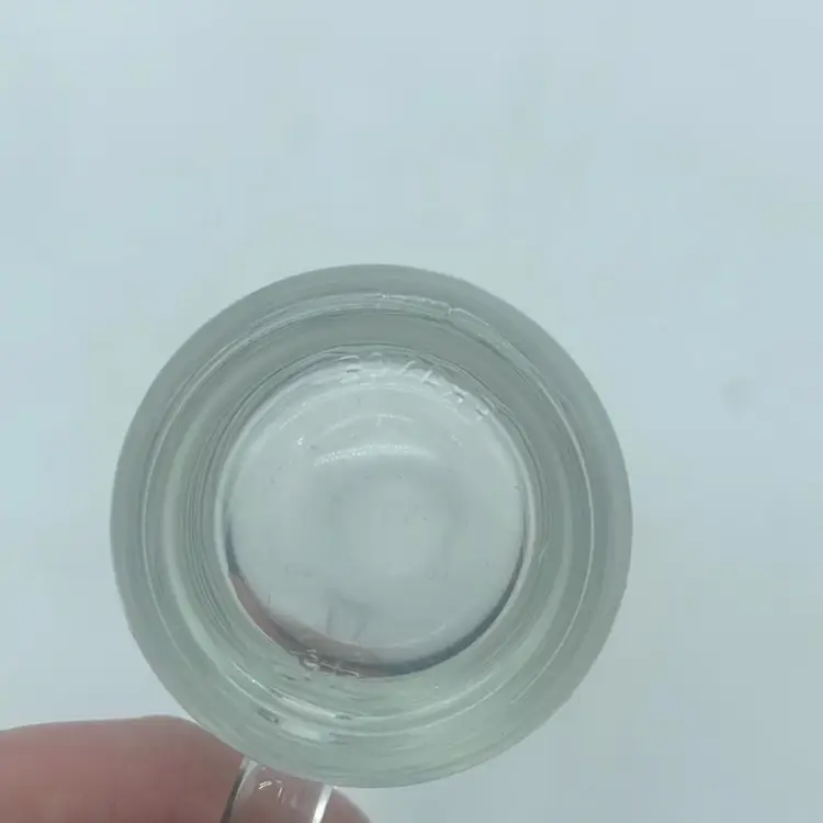 #0818 Set of six French glass shot glasses with loop handles, marked "France 12".