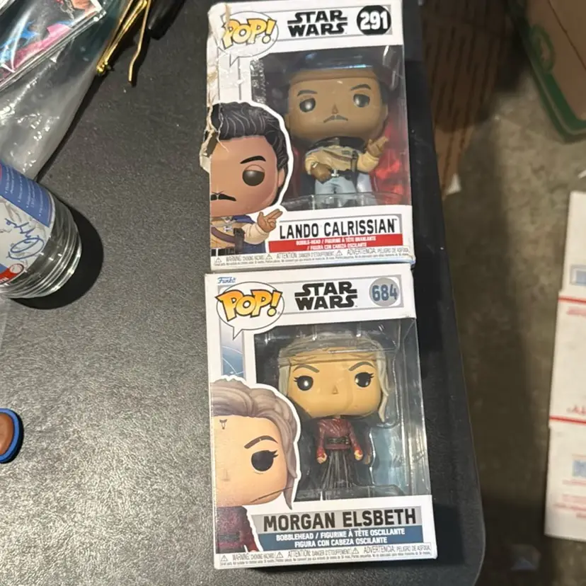2 Star Wars Funkos As Shown