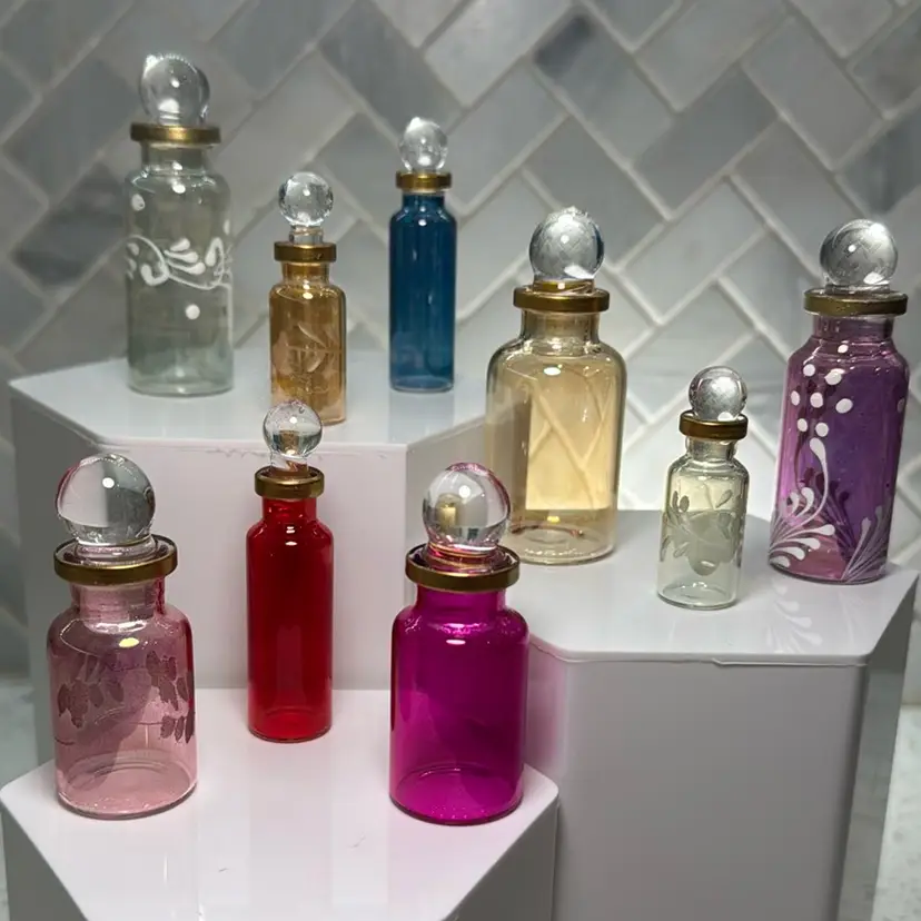 Egyptian Perfume bottles, Empty Glass Mini Bottles for Perfume, Essential Oils or Potion - Set of 9 Decorative Small Vials, Each 2"-3” High, Assorted Colors
