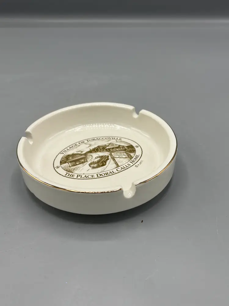 Vintage Ceramic ashtray featuring Village of Tobbaccoville