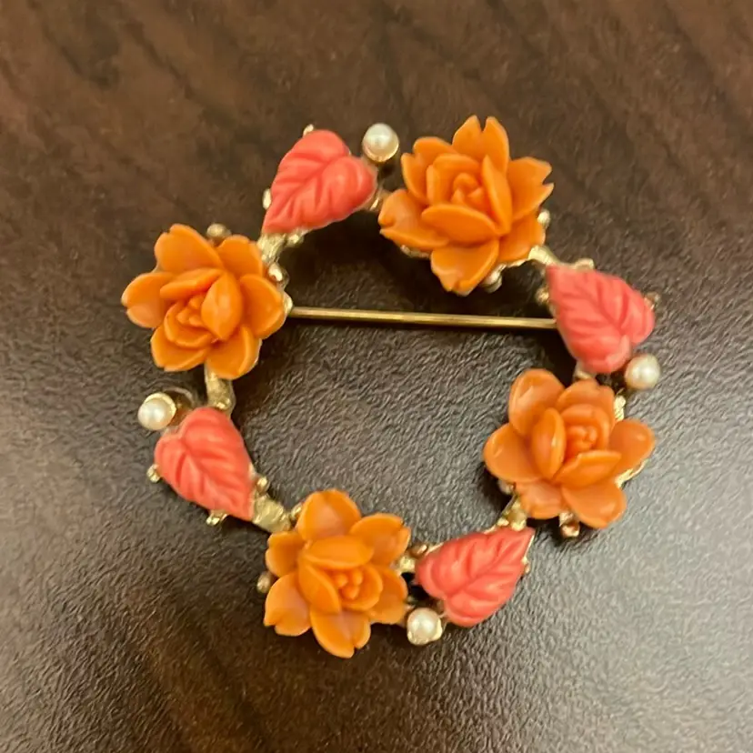 #569 Coral Celluloid Flower And Leaves Brooch