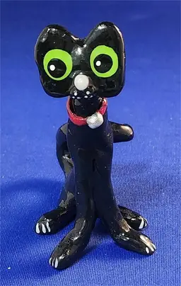 Noodle Cat: Sitting Black Noodle Cat with Red Collar