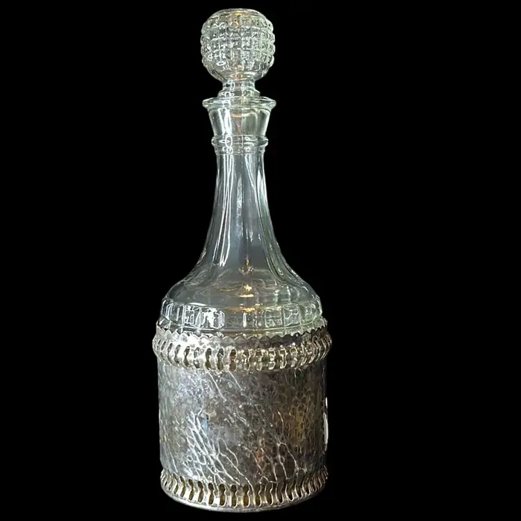 Vintage Pressed Glass Quilted Decanter And Stopper In Hammered Metal Sleeve With A Bakelite Bottom - Made In England