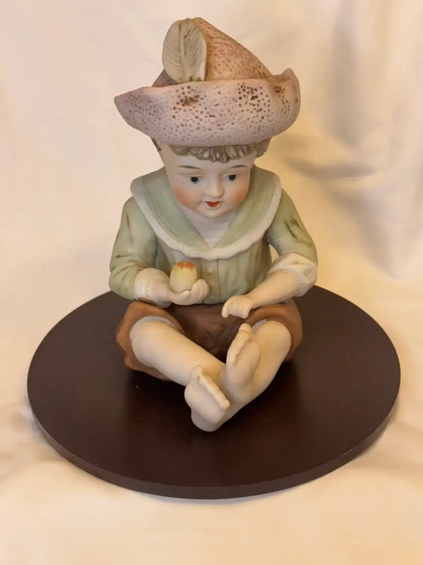 Porcelain Bisque “Piano Baby” Boy Figurine 9”