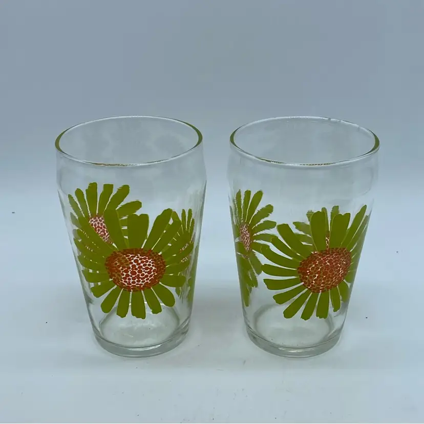 #1334 1970s A pair of vintage clear glass tumblers with Green sunflower decals 4”