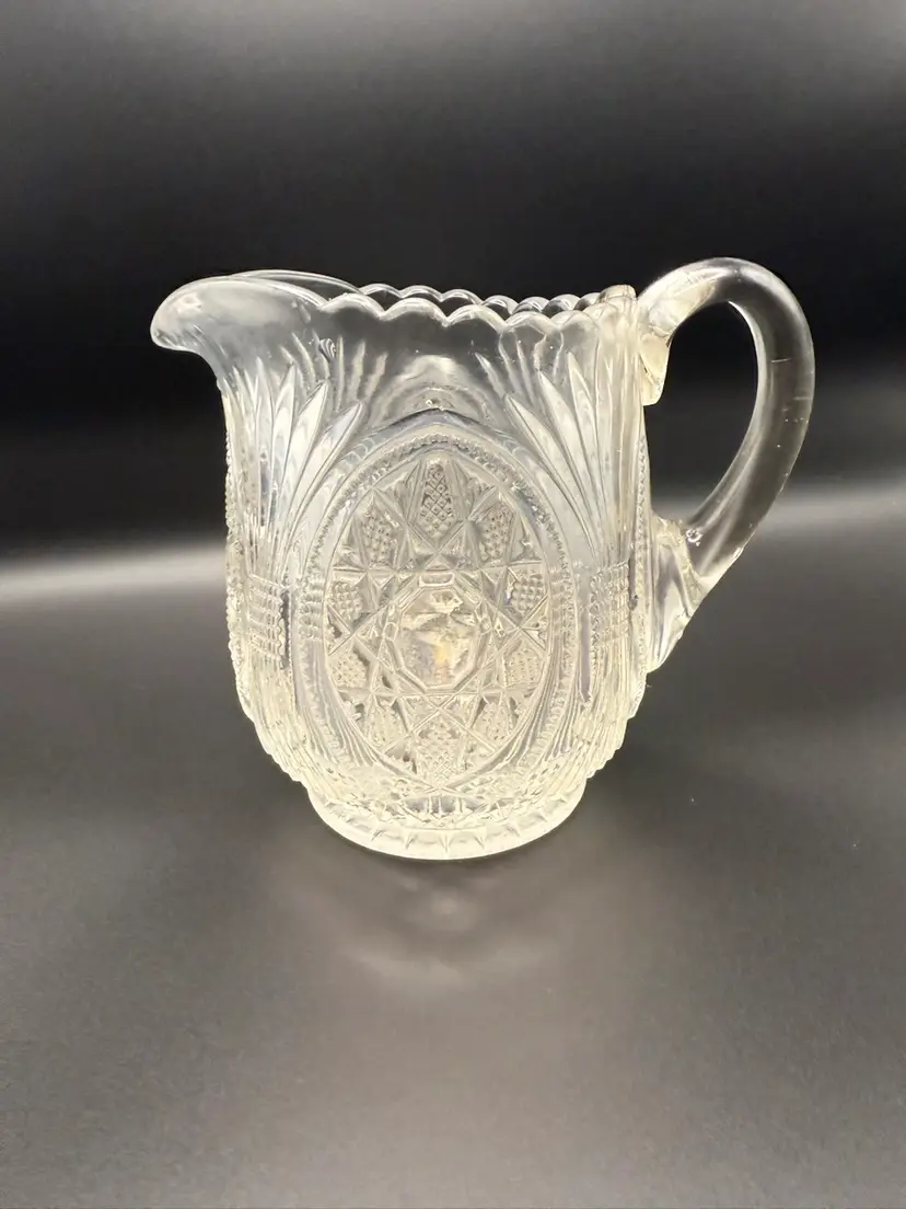 Early American Pattern Glass (EAPG) creamer, specifically identified as George Duncan & Son's Starred Loop - 4.5 in