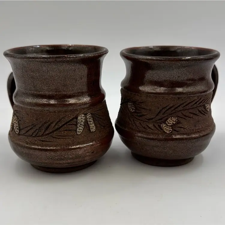 #01 A Set Of 2  8oz Coffee Cups, Sugar Pine Pottery Signed Has Pine Cones And Branches Made In Oregon