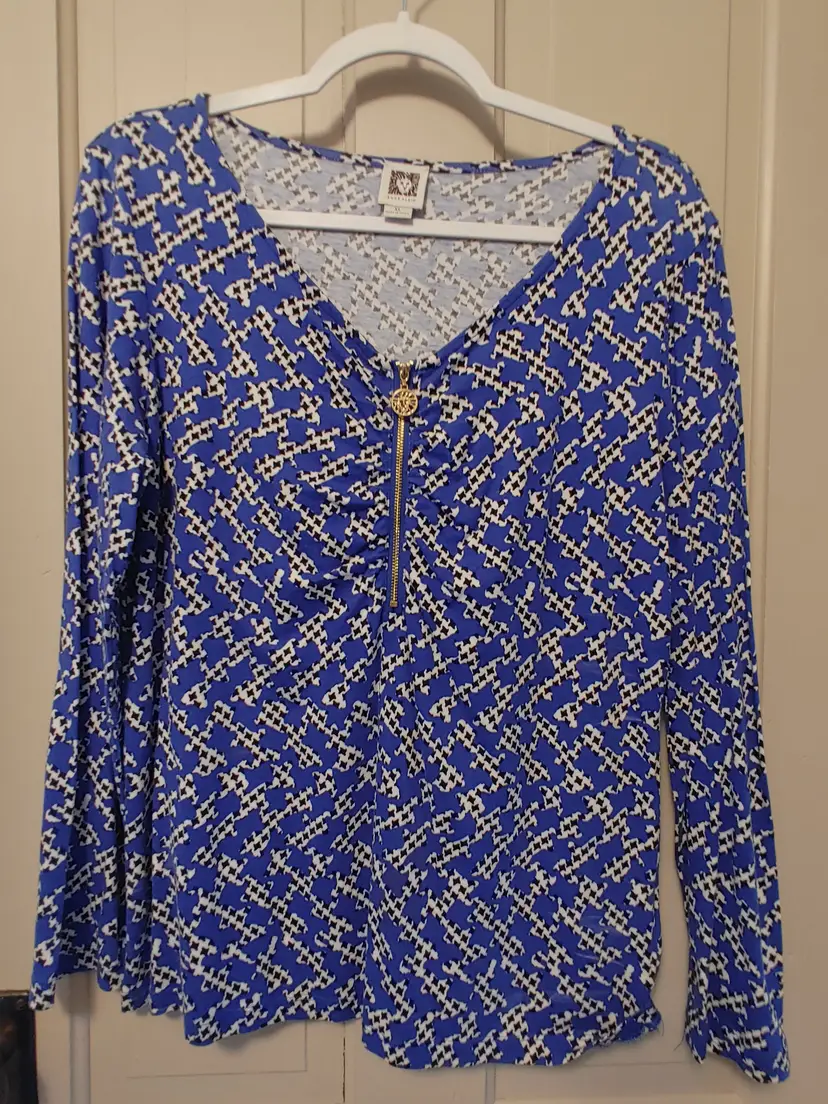 Top- Brand: Anne Klein. Size XL. Blue black white top. Material- 57% cotton, 43% viscose.  No callouts.