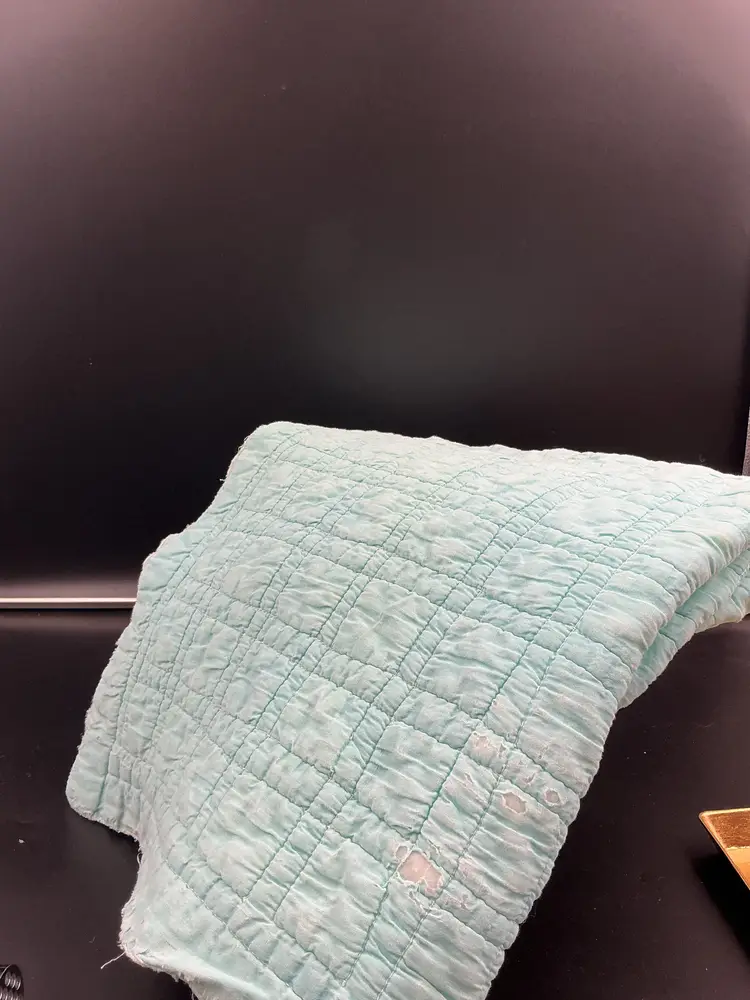 Baby or doll quilt, 28x30 aqua/teak and white squares.  Well loved.