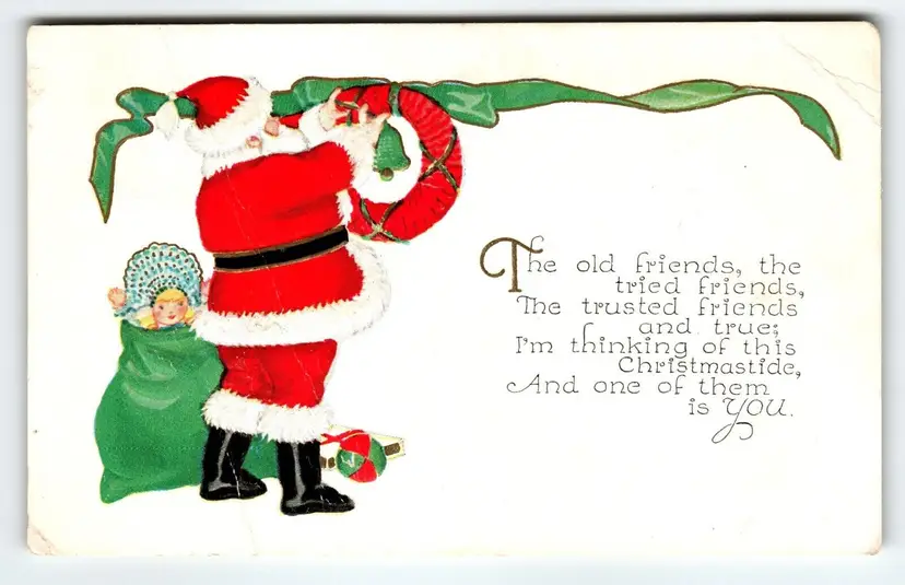 Santa Claus Christmas Postcard Saint Nick Hangs Wreath Decorations Toys 1930
