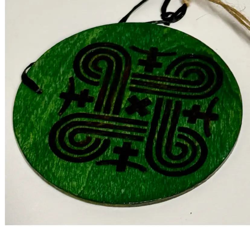 Wood Ornament Featuring Hmong elephant's foot or Hannunvaakuna St. John’s Arms (looped square) Scandinavian symbol.
