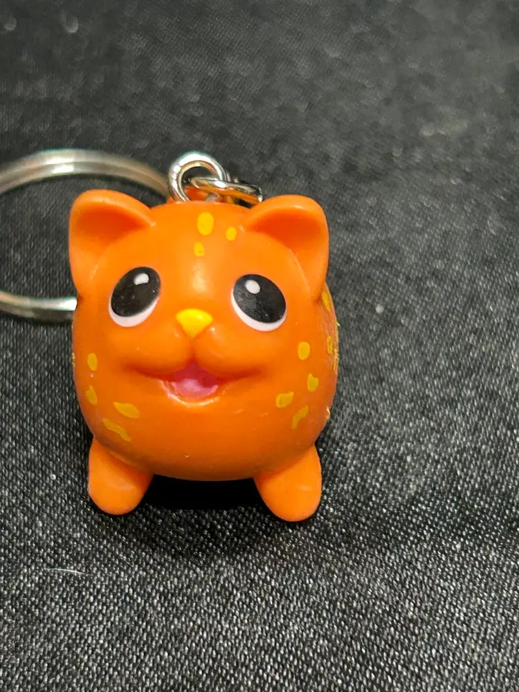 Orange Leopard Chubby Puppies Keychain