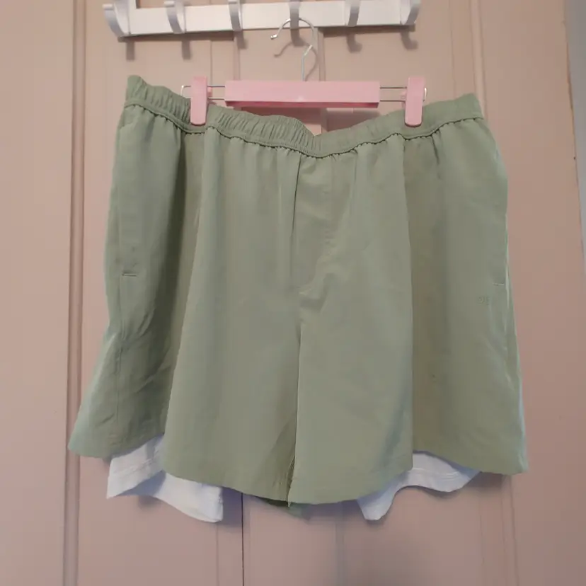 Men's shorts- Brand: DSG. Size XL. Sage 2 in 1 agility shorts. NWT. Retail $35. Material unknown. No condition issues..