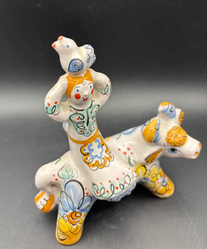 Russian Majolica Figurine, Girl riding a cow with a bird on her head, vintage, hand painted, beautiful