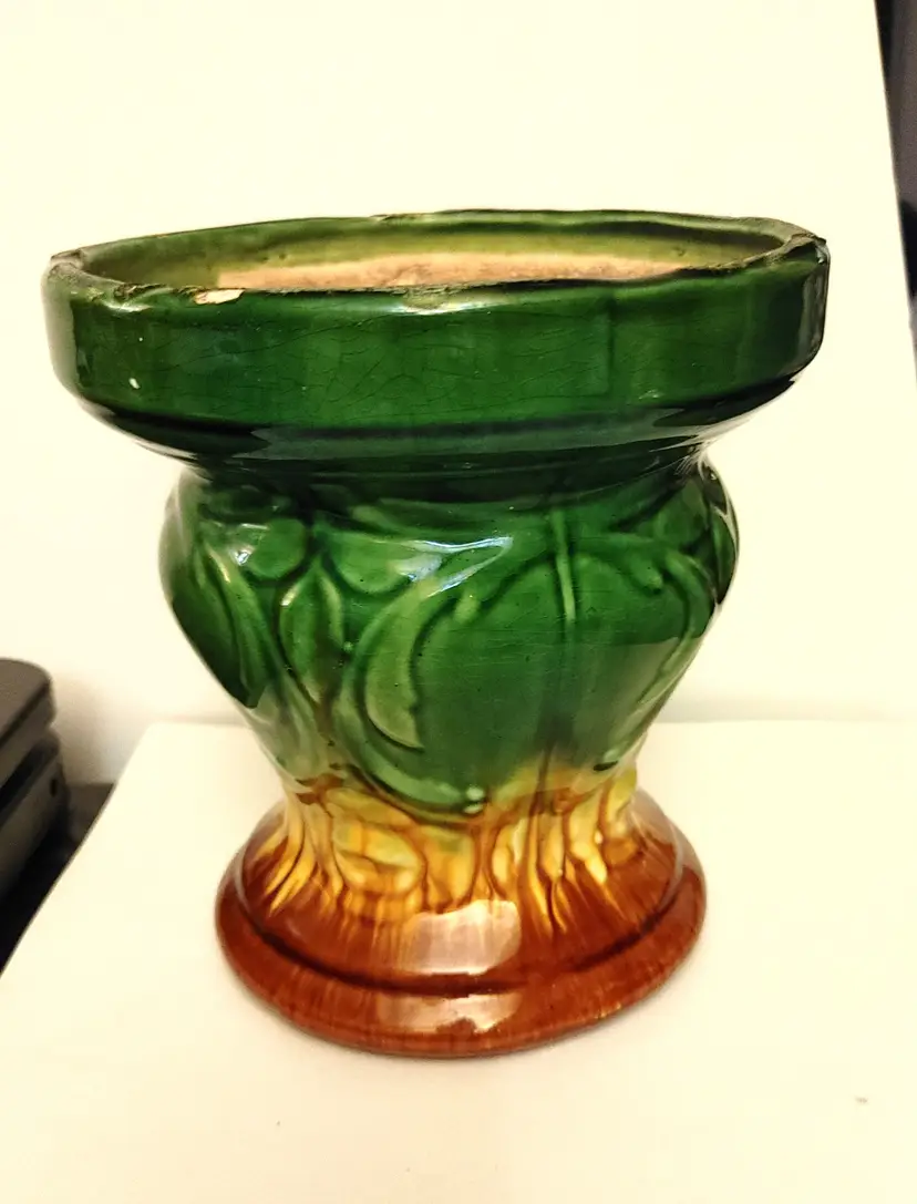 Planter Jardiniere Majolica style. Chip on rim. See pics. 7 inch diameter and 7.25 height.